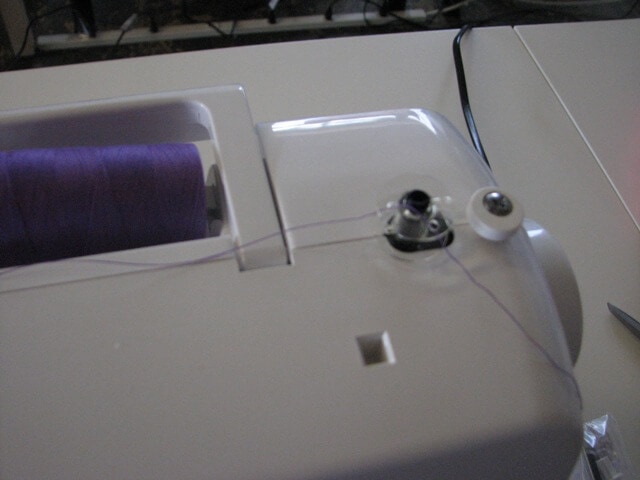 How to thread a sewing machine on iheartnaptime.net #sewing #tips