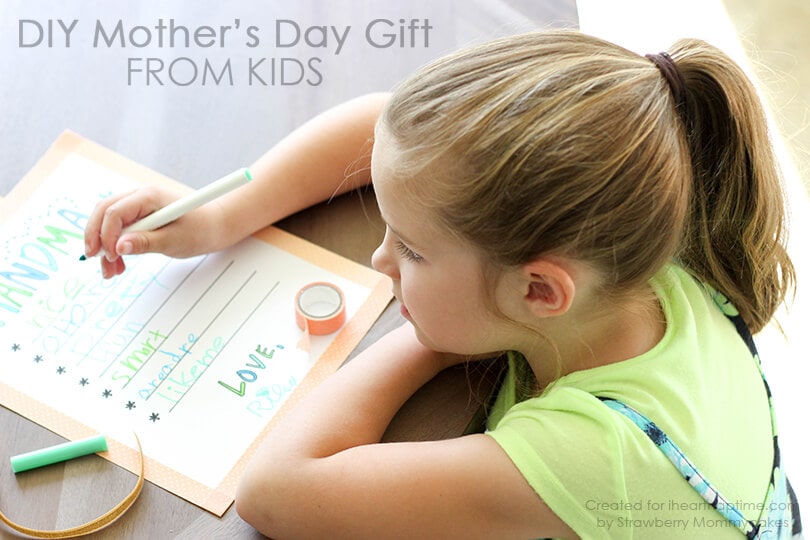 girl drawing on mother's day gift 