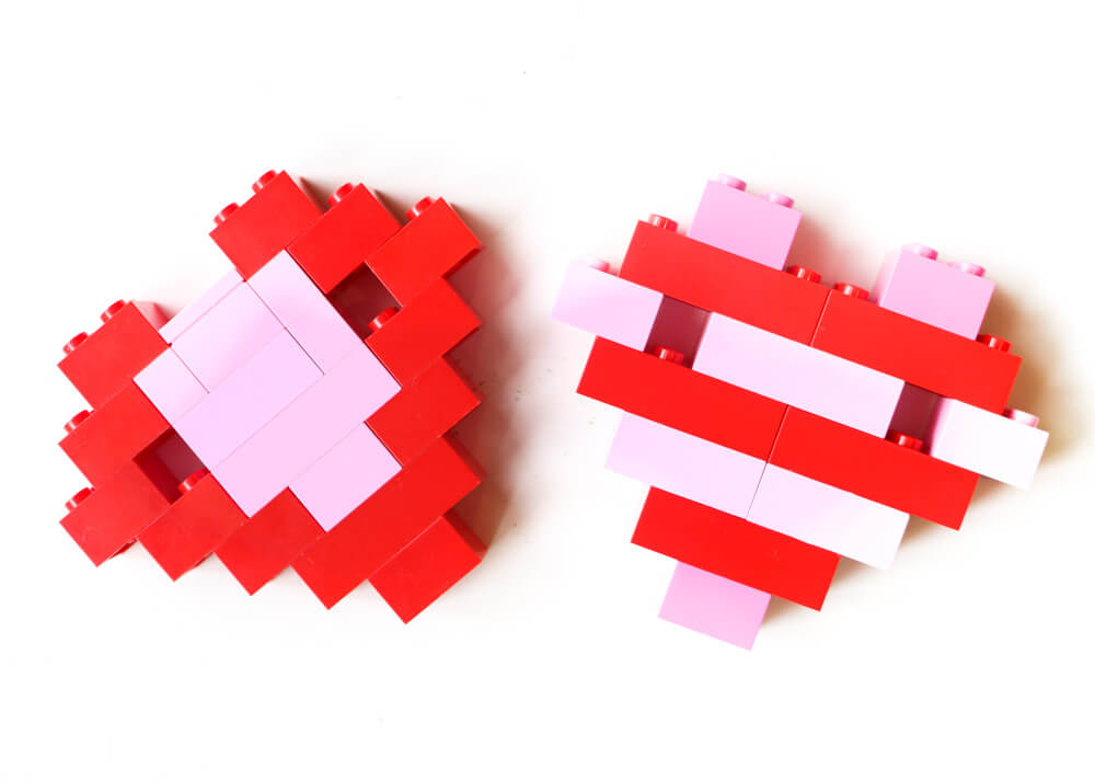 DIY LEGO Heart Valentines - The kids will love helping make these "Never LEGO of my" heart Valentines for their friends, with free printables included!