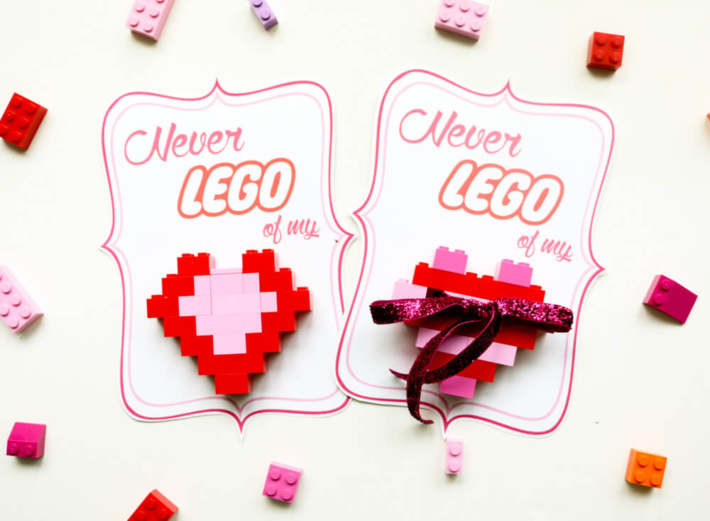 DIY LEGO Heart Valentines - The kids will love helping make these "Never LEGO of my" heart Valentines for their friends, with free printables included!