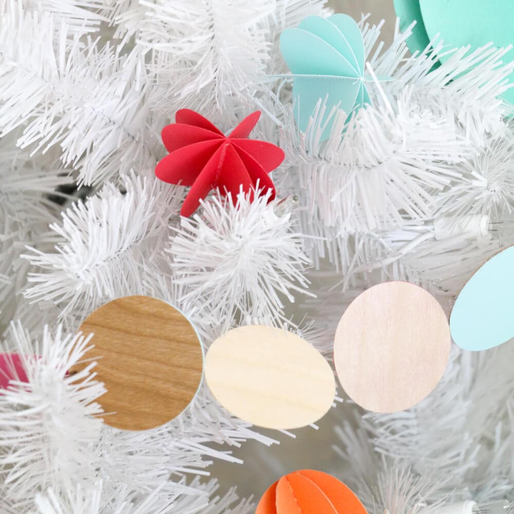 Colorful 3D Sewn Paper Ornaments... a simple and inexpensive way to decorate your Christmas tree this year!