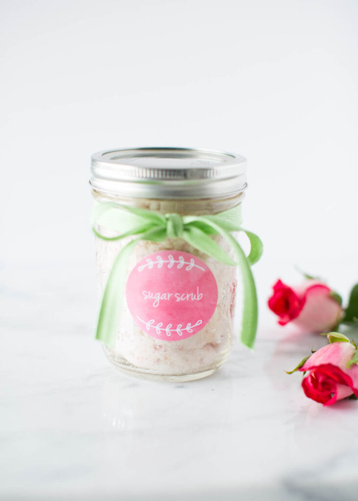 Vanilla sugar scrub in a mason jar with green ribbon