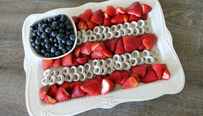 American flag of fruit and pretzels on white plate