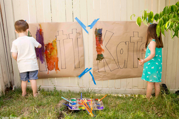 Kids painting on their names