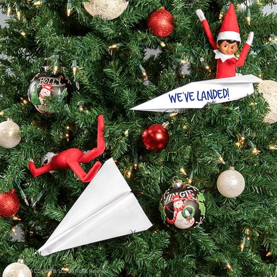 Elf and Paper Plane in Christmas Tree