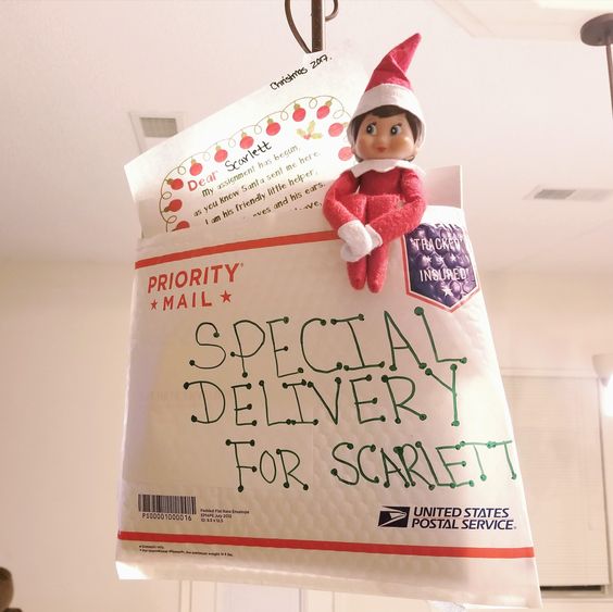 Special delivery envelope with elf inside.