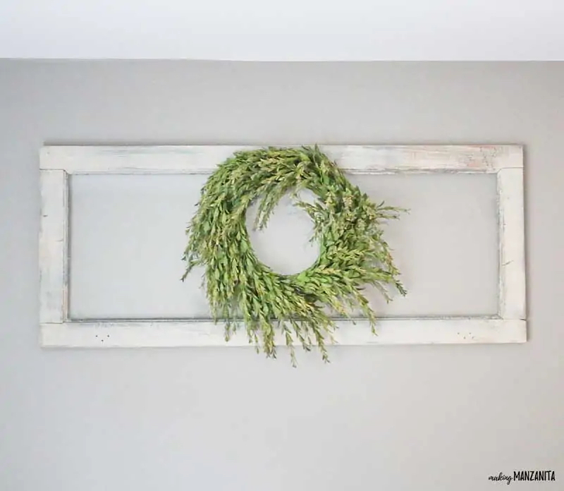 Green wreath hanging on a wall
