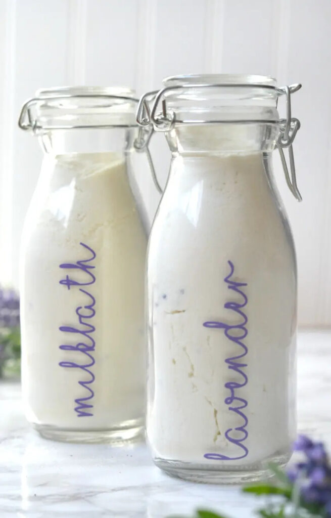 Lavender and dry milk mixture in 2 tall jars
