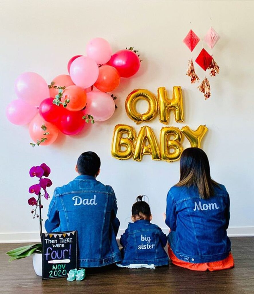 Matching Jean Jackets pregnancy announcement