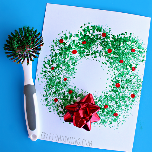 Easy Christmas Crafts for Kids...festive ideas to help bring the holiday cheer into your home this season. Simple instructions perfect for little hands. Dish Brush Christmas Wreath